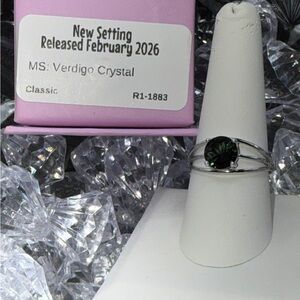 Ryze party sterling Silver Ring with Verdigo Crystal size 9.  New in box